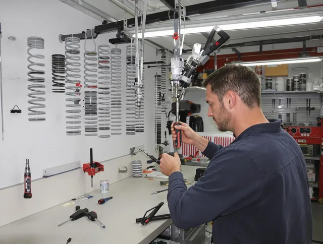 Stallings Garage Door Repair safety certified technician performing precision spring replacement in Stallings